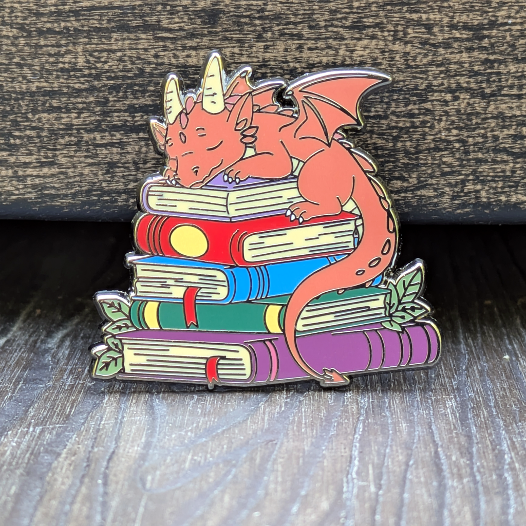 Mimic Gaming Co - Dragon Sleeping on Top of Books Enamel Pin - 1.5"